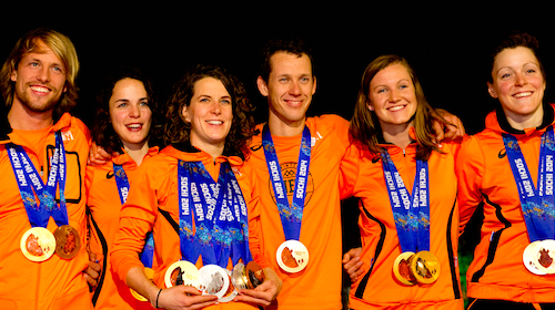Some of the Dutch speed skate winners pose with their Olympic medals.